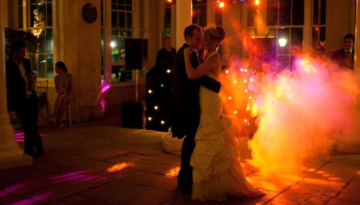 bride and groom dancing in the conservatory at syon Rebecca and Matts Wedding Photographs at Syon Park, London