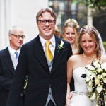 Wedding Photograph of Beth and Alex leaving St Bride's Church, London