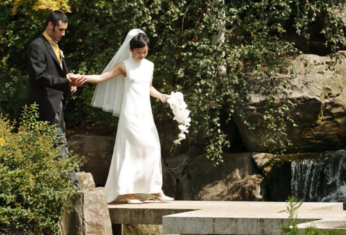 Bride and groom photographed at the Orangery Holland Park in London