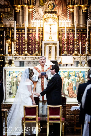 New Photo Book for Wedding at The Royal Institute of British Architects (RIBA), London 3 Couple exchanging vows in London Church