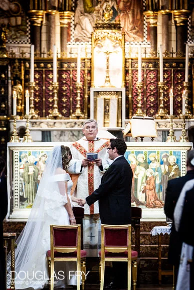 New Photo Book for Wedding at The Royal Institute of British Architects (RIBA), London 3 Couple exchanging vows in London Church