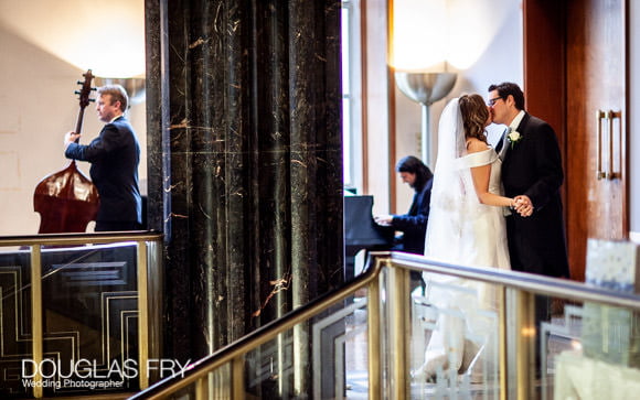 Couple photographed at wedding reception at RIBA in London