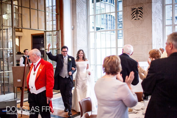 Couple entering wedding breakfast at RIBA