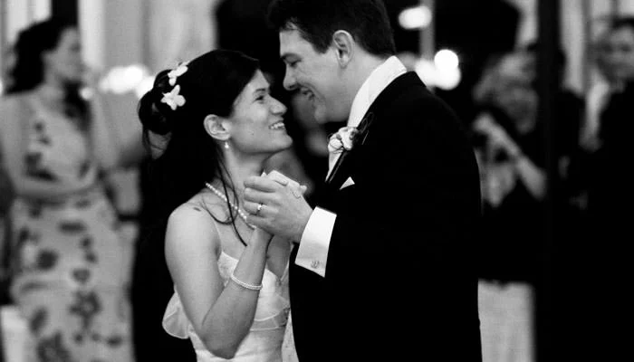 Wedding Photograph of bride and groom dancing at Heythrop Park, Oxfordshire Wedding Photograph of bride and groom dancing at Heythrop Park, Oxfordshire