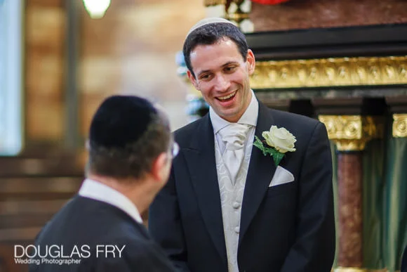 Wedding Photography The Berkeley Hotel & Synagogue in St Petersburg Place, London 4 Groom waiting for bride to arrive at london synangogue. Photograph by Douglas Fry