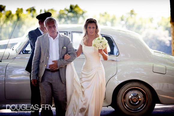 Bride arriving by rolls royce