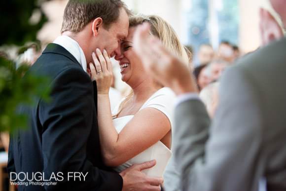 Applause during wedding vows photographed by Douglas Fry