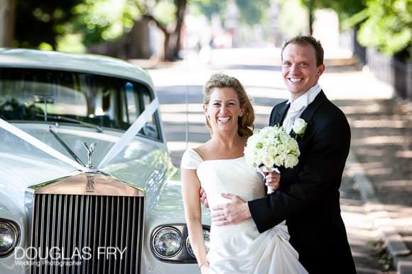 Ranelagh Gardens Wedding Photograph of bride and groom with car