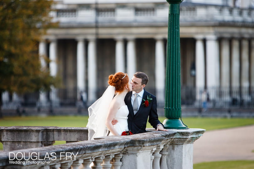 Wedding Photographer Queens House - Greenwich - Couple kissing