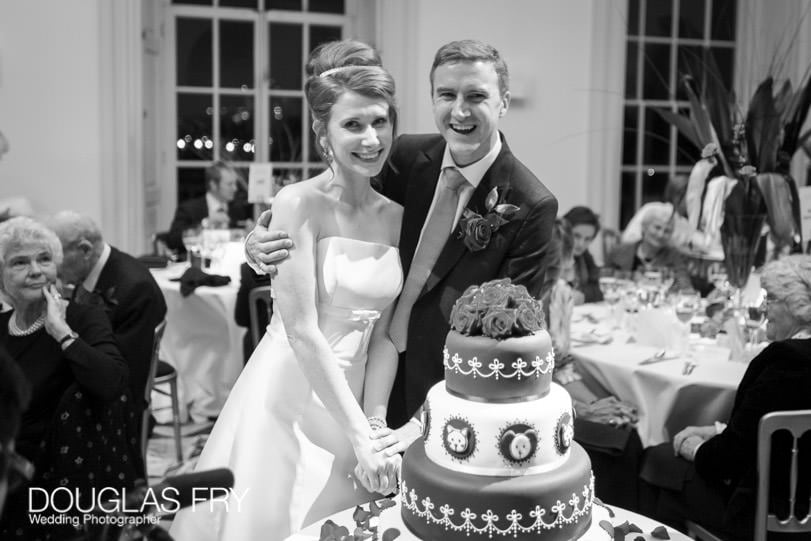 Wedding Photographer Queens House - Greenwich - cake cutting