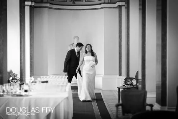 See Why The Lansdowne Club is an Ideal Venue for Your Wedding 8 Couple enter reception - black and white wedding photograph
