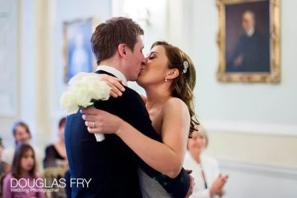 See Why The Lansdowne Club is an Ideal Venue for Your Wedding 1 Bride and groom kissing at Lansdowne Club in London