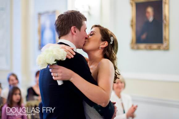 Couple kissing at London hotel