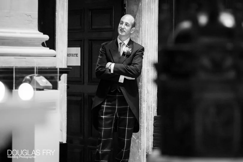 Helen and William's Wedding Photographs at St Stephen Walbrook and Skinners Hall in London 2 groom Wedding Photography at St Stephen Walbrook and Skinners Hall in London