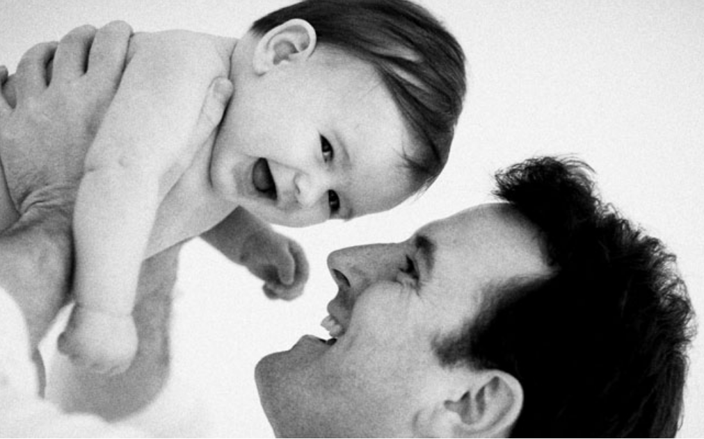 father and baby photograph taken at home of new baby