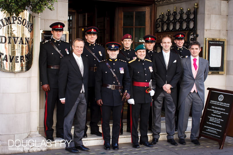 wedding photographer - groom and ushers at simpsons in the strand in London