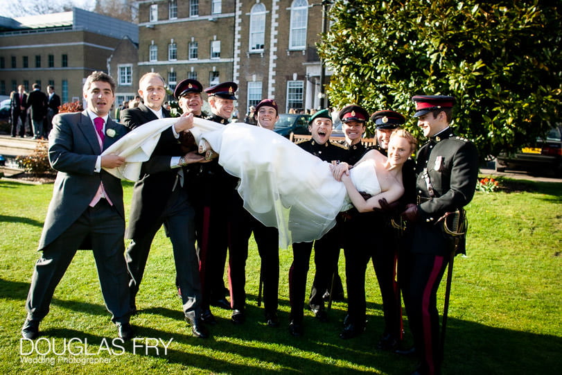 bride with ushers and groom - wedding photograph