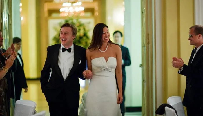 bride and groom entering the dining room at claridges Wedding Photographer at St Mary the Boltons, the Bumpkin Restaurant and Claridges 2