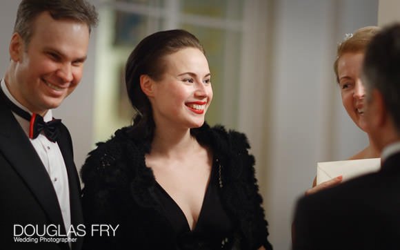 Guest during London wedding - photographed with friends.