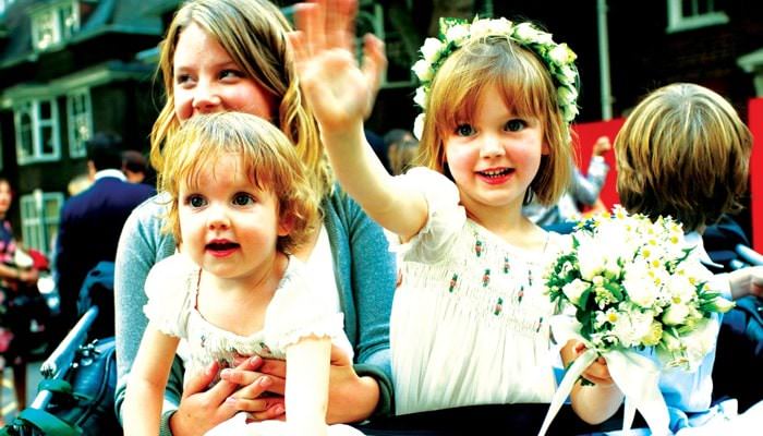 Children leaving wedding in Chelsea in Tuk Tuk