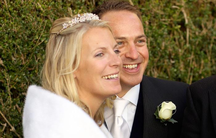 bride and groom together outside Abby and Mark's Wedding Photographs at Hambeldon 1