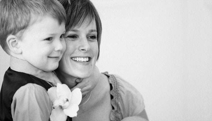 Bride and page boy photographed together at wedding