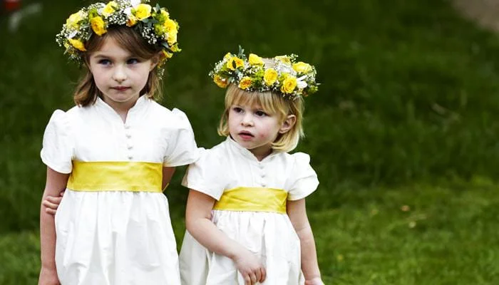 bridesmaids with yellow saches Harriet and Simon's Wedding Photographed in Hertfordshire 2