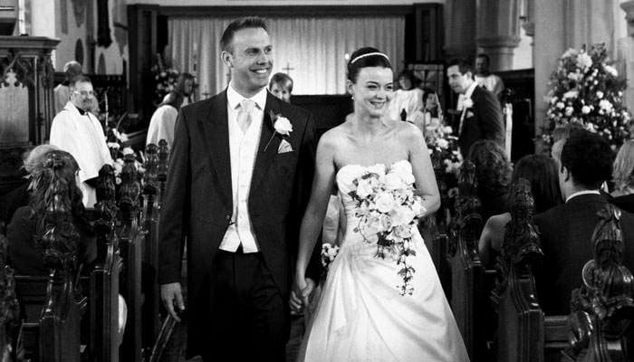 bride and groom in church Lorna and Richard Wedding Photographs at the Warren Golf Club, Essex 2