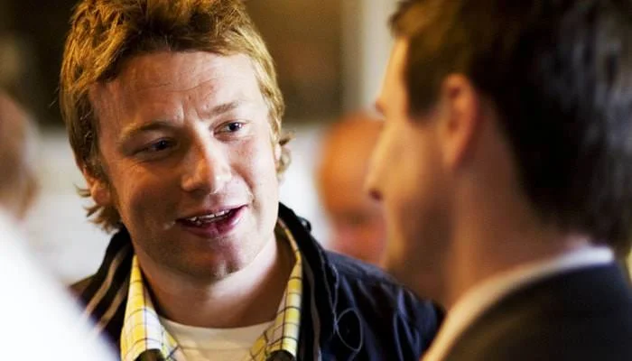 jamie oliver chatting at the wedding Wedding Photographed at Wimpole Hall, Royston in Cambridgeshire for Monica and Geoff 1