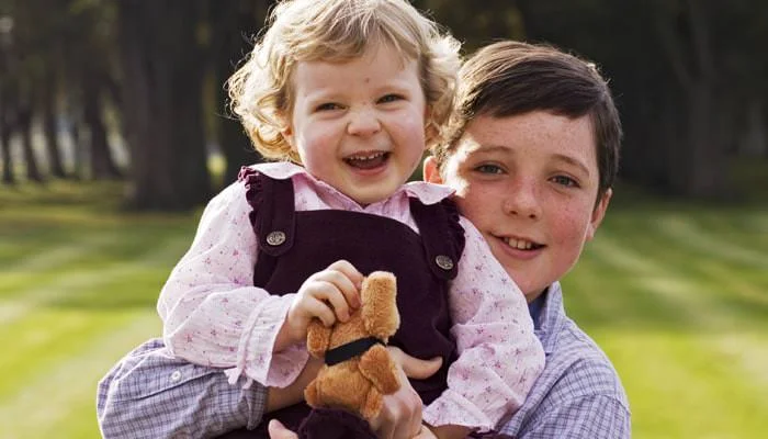 girl and boy outside Photographs of Sally's Birthday Party 1