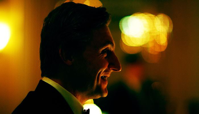 groom at the reception Wedding Photographer at St Mary the Boltons, the Bumpkin Restaurant and Claridges 3