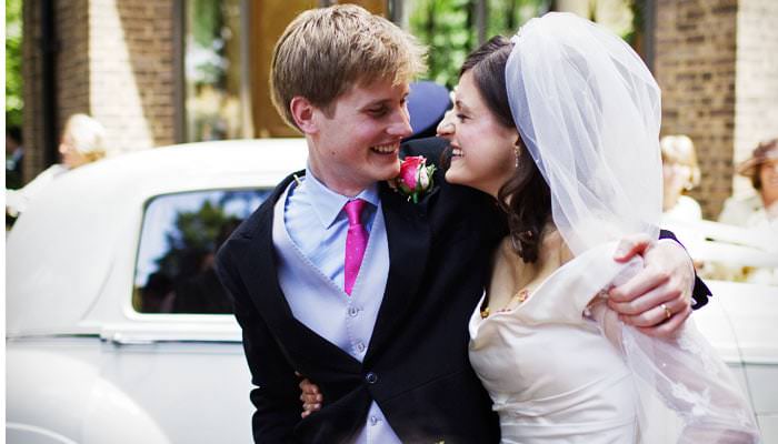 bride and groom at htb Tandem Bicycle for Going Away at London Wedding 2