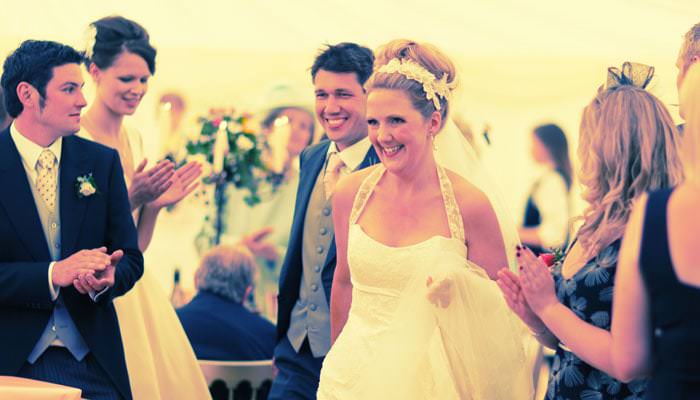 Bride and Groom going into dinner Wedding photograph