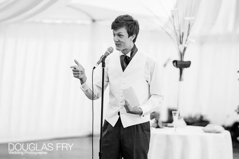 Wedding Photographer for Rosie & Mark at Sherborne Abbey, Dorset 16 speaches photographed by Douglas Fry during country wedding