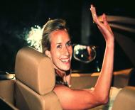 Wedding Photographer - Rachel leaving in car in Kemble