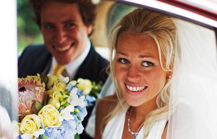 Wedding photograph of Joss and Jono in Wedding Car