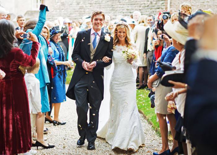 Wedding Photograph of bride and groom at Kemble church