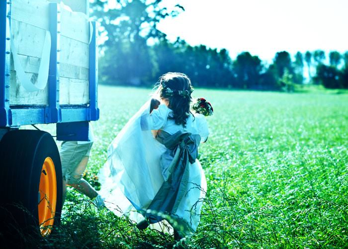 Atmospheric Wedding Photograph of bridesmaid in Field - Kemble, Gloucestershire