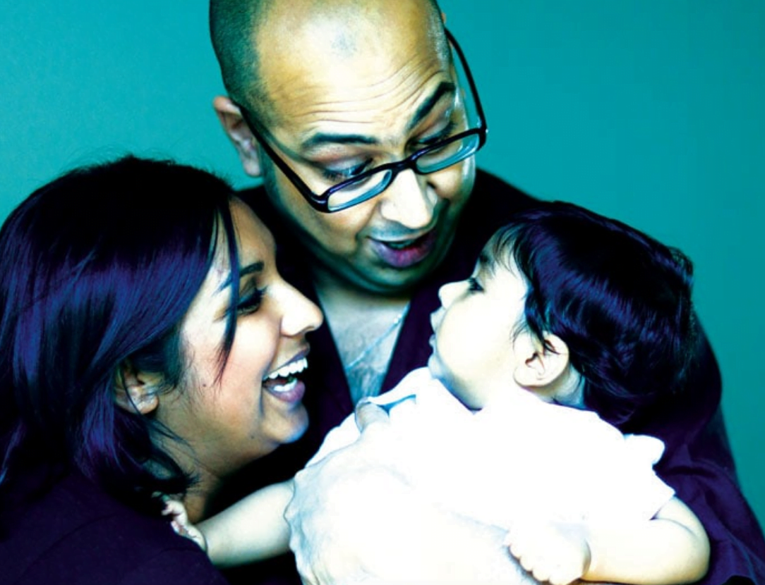 Baby photographed with parents in Richmond