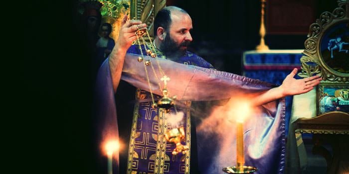 christening_photographer_church Photograph of Vicar during Christening at St Dunstans Church Fleet Street