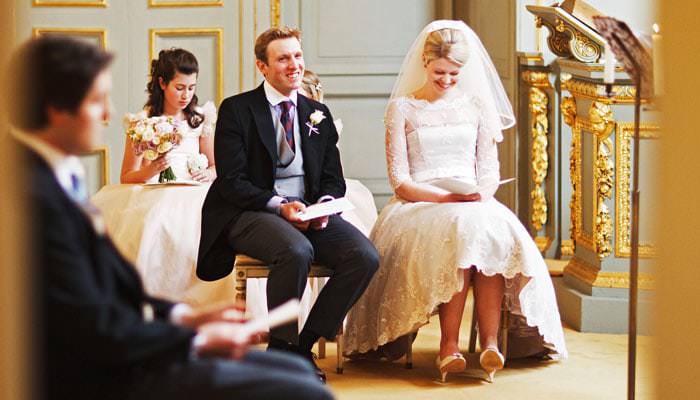 Wedding Photograph of Couple during marriage at The Queen's Chapel