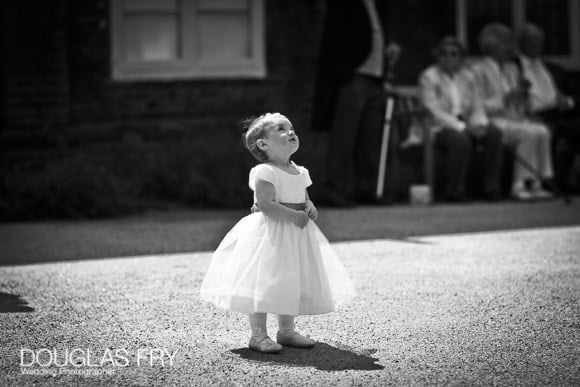 Black and white photograph of child at fulham palace