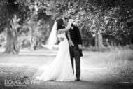 wedding photographer couple kissing at fulham palace