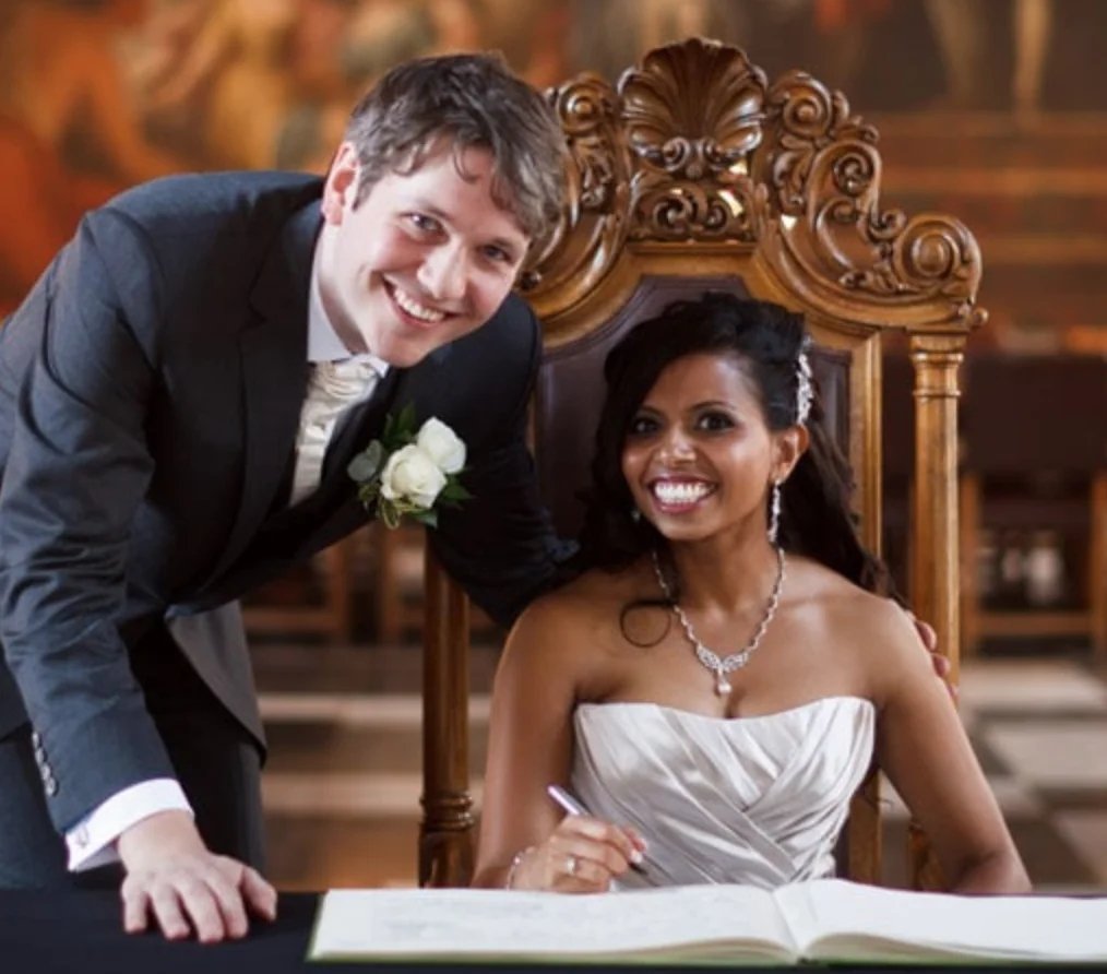 Wedding Photography and Video at Bhaktivedanta Manor and the Painted Hall, Old Royal Naval College, Greenwich 1 Couple signing register