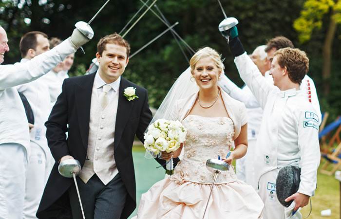 Wedding Photograph - Bride and Groom with Swords at Hurlingham Club, Fulham, London