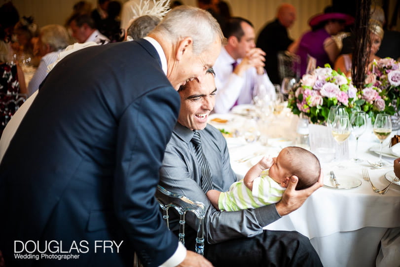 New baby photographed during wedding