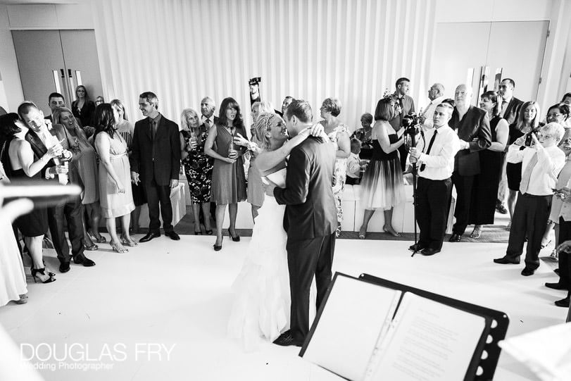 couple dancing at wedding at coworth park