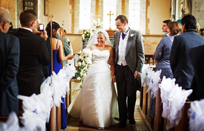 Couple leaving church in Cambridge