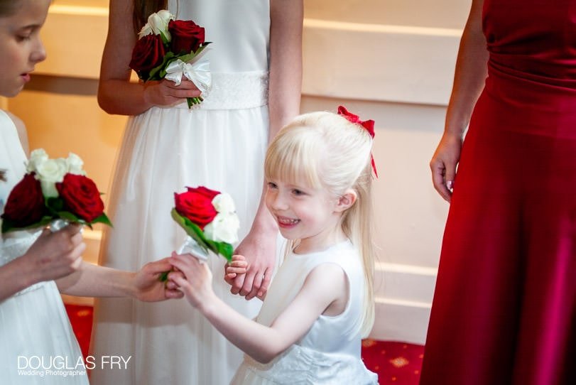 bridesmaid photographed at Cambridge Cottage Kew by wedding photographer