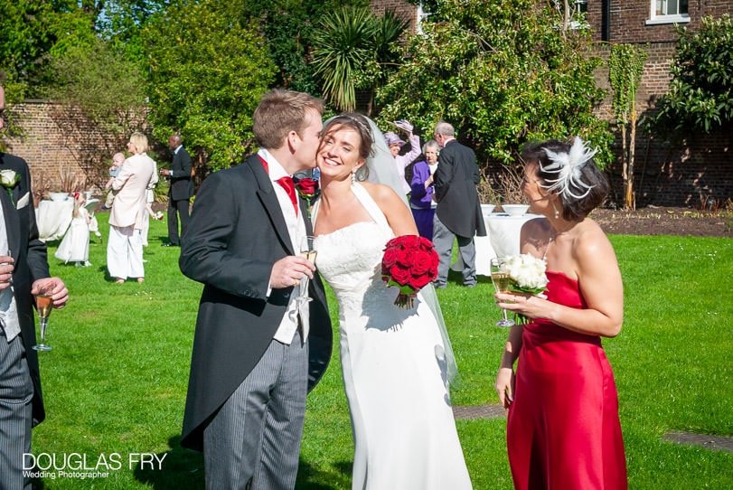 bride and groom photographed at Cambridge Cottage Kew by wedding photographer